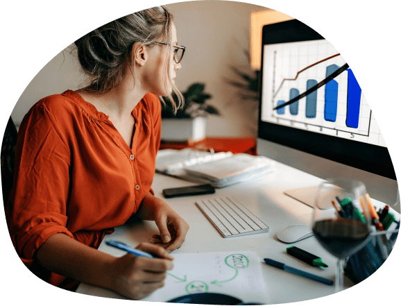 Woman looking at a growth chart on a computer